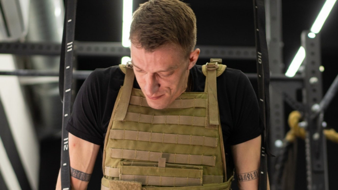 Man training in a weighted vest